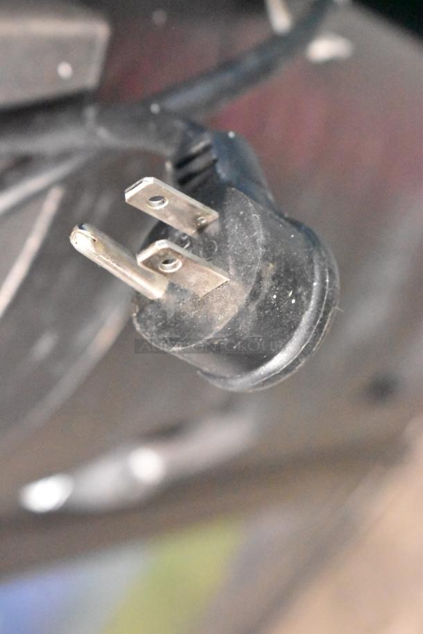 Crane 5800-4 vending machine power plug detail, showing a standard two-prong design, compatible with 115 volts, 1 phase.