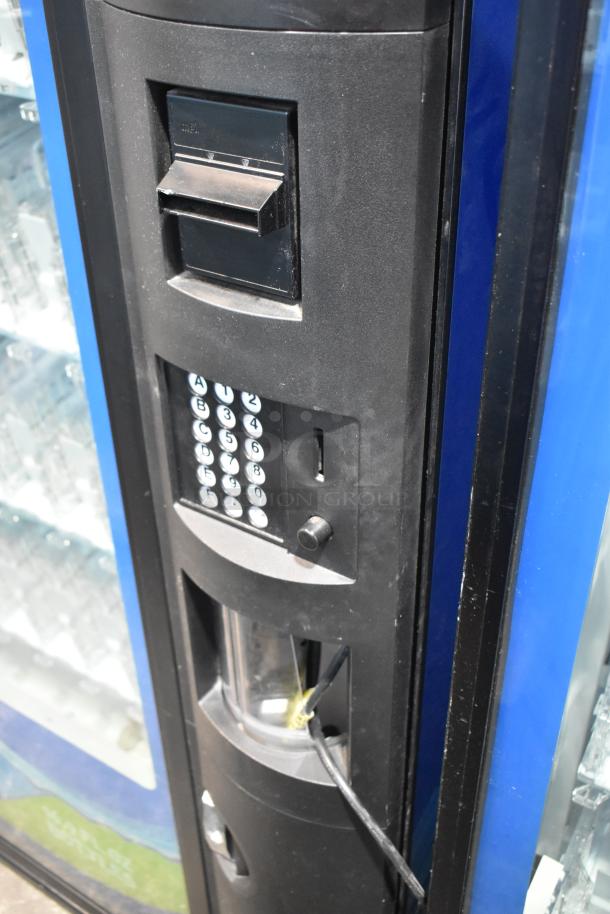 Crane 5800-4 metal vending machine with bill acceptor, keypad, and cable. Model 5800-4. 115 volts, 1 phase.