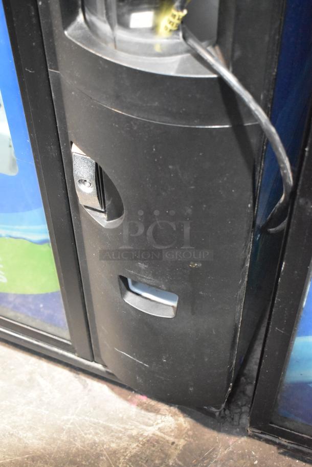 Crane 5800-4 metal commercial vending machine, bill acceptor visible, 115 volts, 1 phase, good condition.