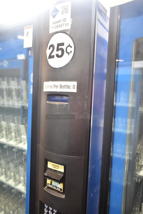 Crane 5800-4 vending machine with bill acceptor, 115 Volts, 1 Phase. Displays "25¢" and Asset ID: 7712955710.