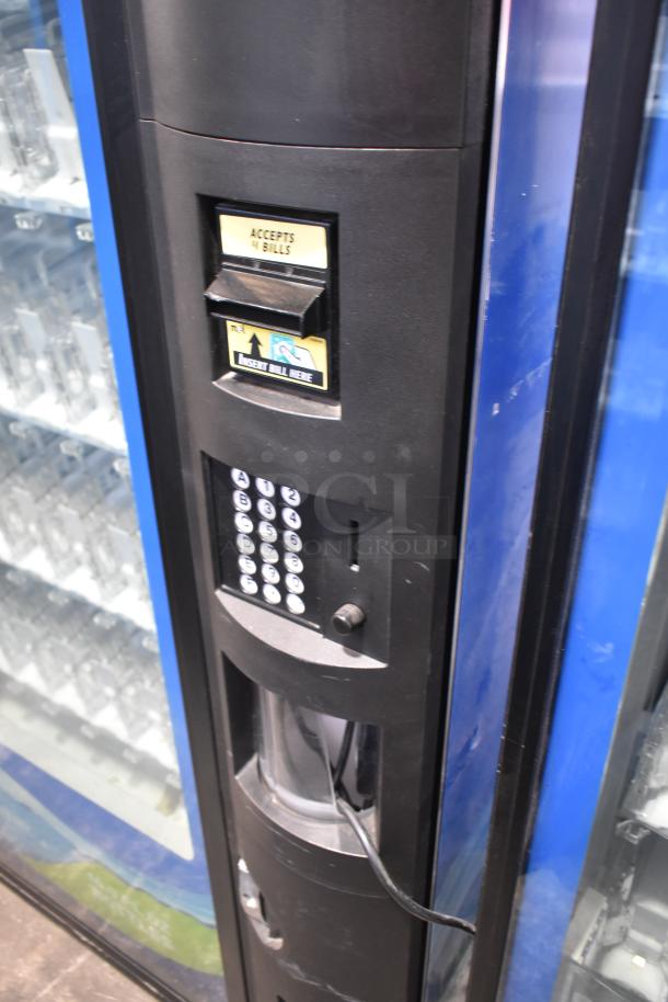 Crane 5800-4 metal commercial drink vending machine with bill acceptor, keypad, in good condition. 115 volts, 1 phase.