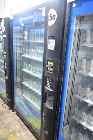 Crane 5800-4 metal vending machine with bill acceptor, accepts 25¢, 115V, 1 phase, clear display, and asset ID tag.