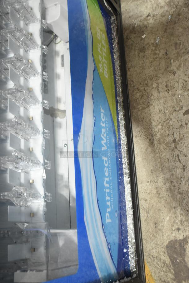 Crane 5800-4 metal drink vending machine with bill acceptor, showing glass damage. 115 volts, 1 phase.