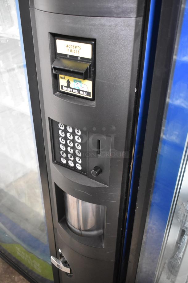 Crane 5800-4 metal commercial drink vending machine, features bill acceptor, keypad, and display. 115 volts, 1 phase.