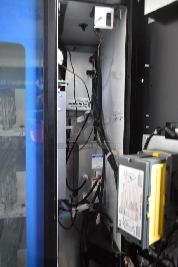 Crane 5800-4 metal commercial bottled drink vending machine interior with wiring, bill acceptor, and control panel. 115 volts, 1 phase.