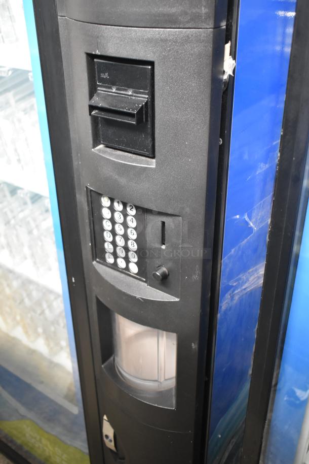 Crane 5800-4 metal commercial drink vending machine with bill acceptor, keypad, and coin slot. 115 volts, 1 phase.
