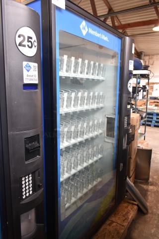 Crane 5800-4 metal commercial drink vending machine with bill acceptor, 115V, 1 phase, visible condition in warehouse.