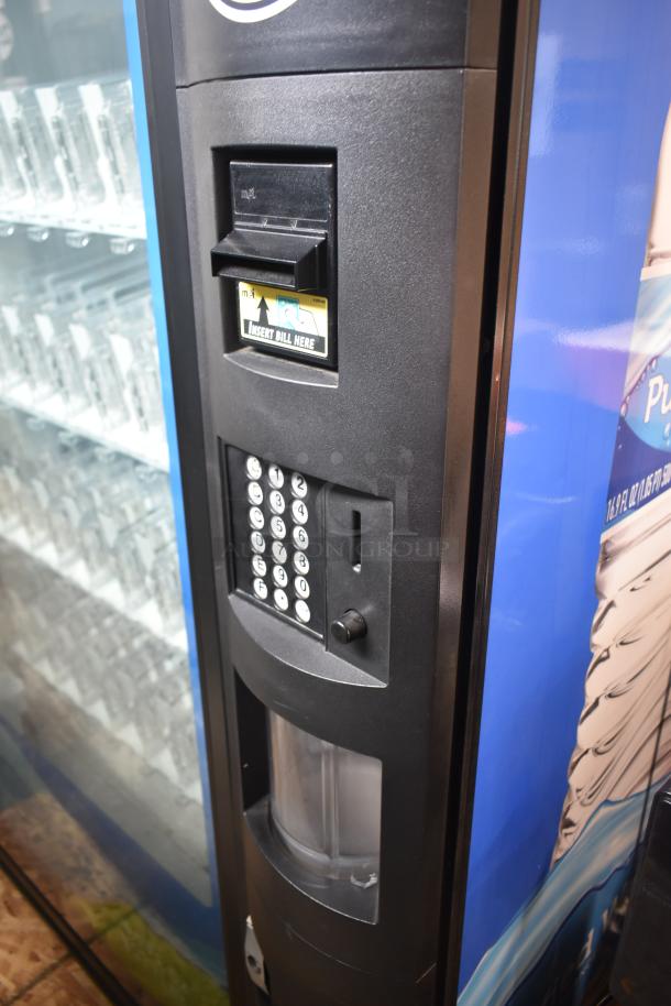 Crane 5800-4 metal commercial vending machine with bill acceptor, 115 volts, 1 phase, keypad interface, visible drink slots.