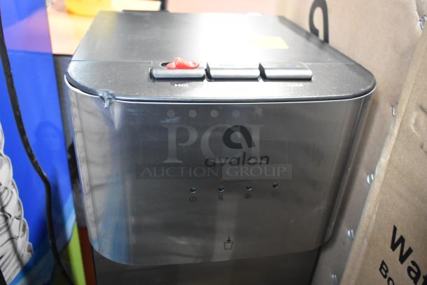 Avalon A4BLWTRCLR bottom loading water cooler, stainless steel finish, visible control buttons, slight edge damage.