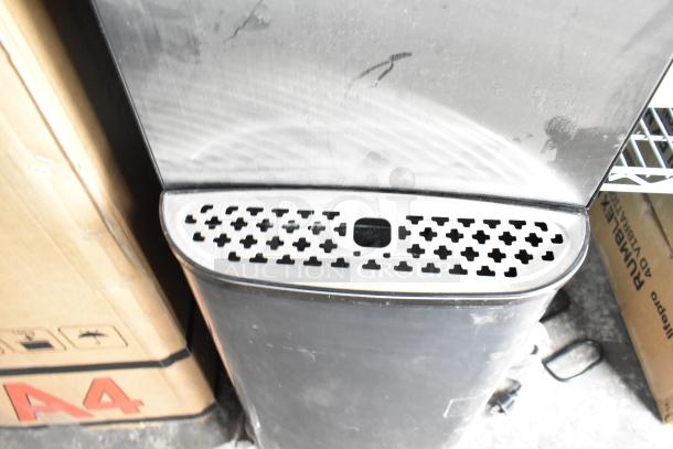 Avalon A23F bottom loading water cooler dispenser, visible top section with grid design, 120V, 1 phase.