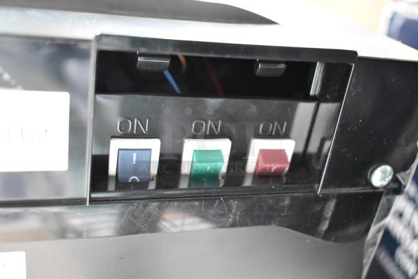 Avalon A23F water cooler control panel with on/off switches for hot, cold, and room temperature water. Black finish.