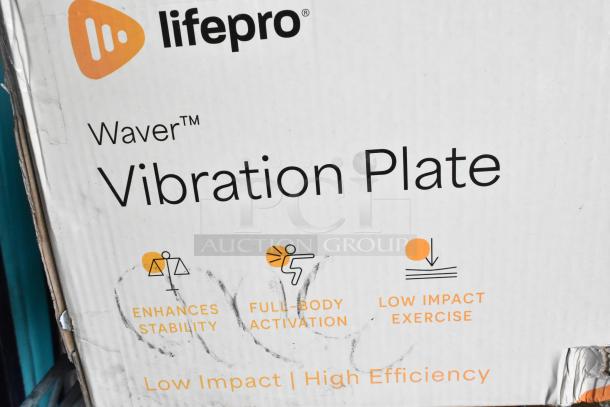 "Brand new LifePro Waver Vibration Plate box with minor scratches and dents, features include stability, full-body activation."