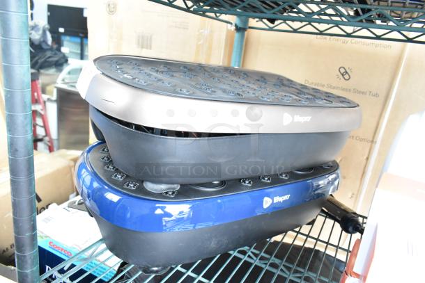 Two LifePro vibration plates stacked, featuring dual color design, good condition, visible branding. Auction includes both units.