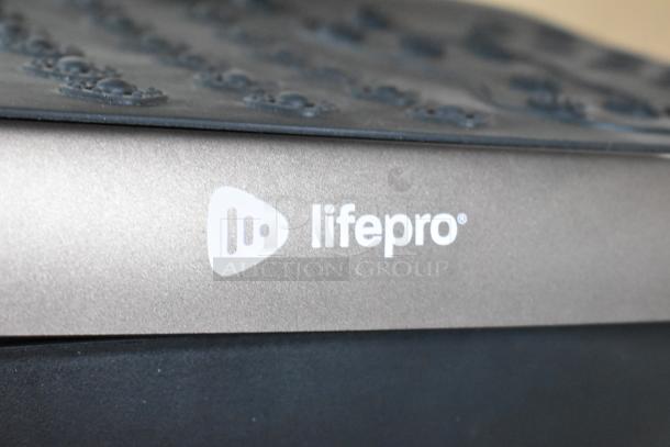 Two LifePro vibration plates in excellent condition, featuring the LifePro logo on the side. Durable and premium quality.