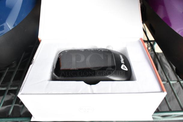 LifePro Relievacup Smart Cupping Device in open box, black with logo, shown in packaging. Part of four-item auction set.