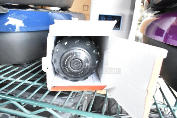 LifePro Velocity Vibrating Massage Ball in box on shelf; power and function buttons visible, brand label on ball.