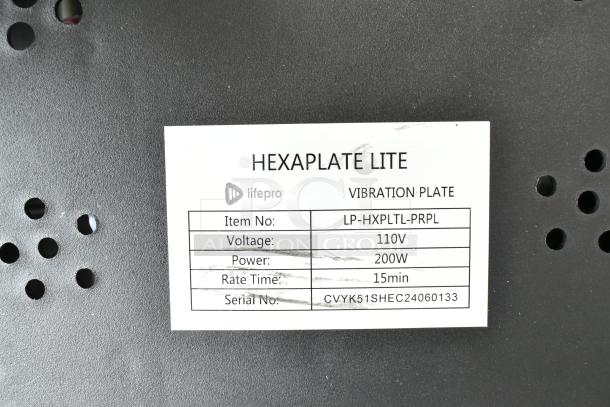 LifePro Hexaplate Lite vibrating plate label showing item no. LP-HXPLTL-PRPL, 110V, 200W, 15min rate time.