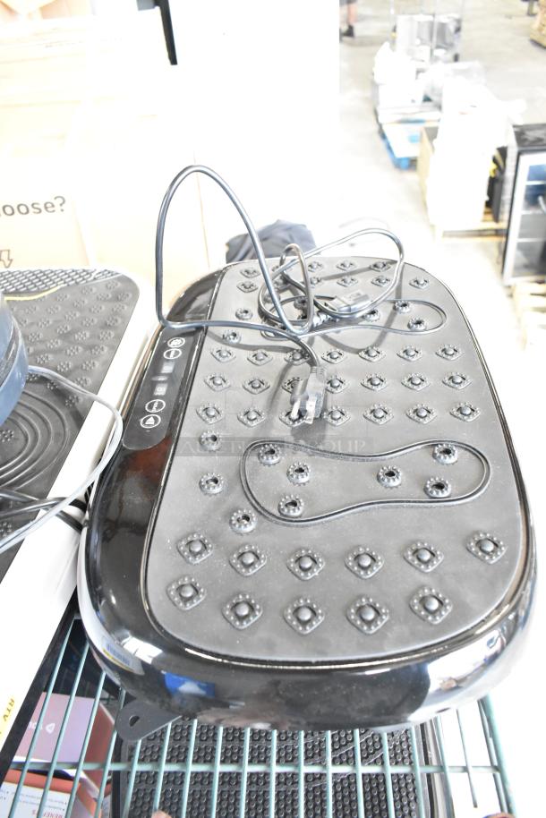 Hurtle HURVBTR36 vibration plate in good condition with visible control buttons and power cord.
