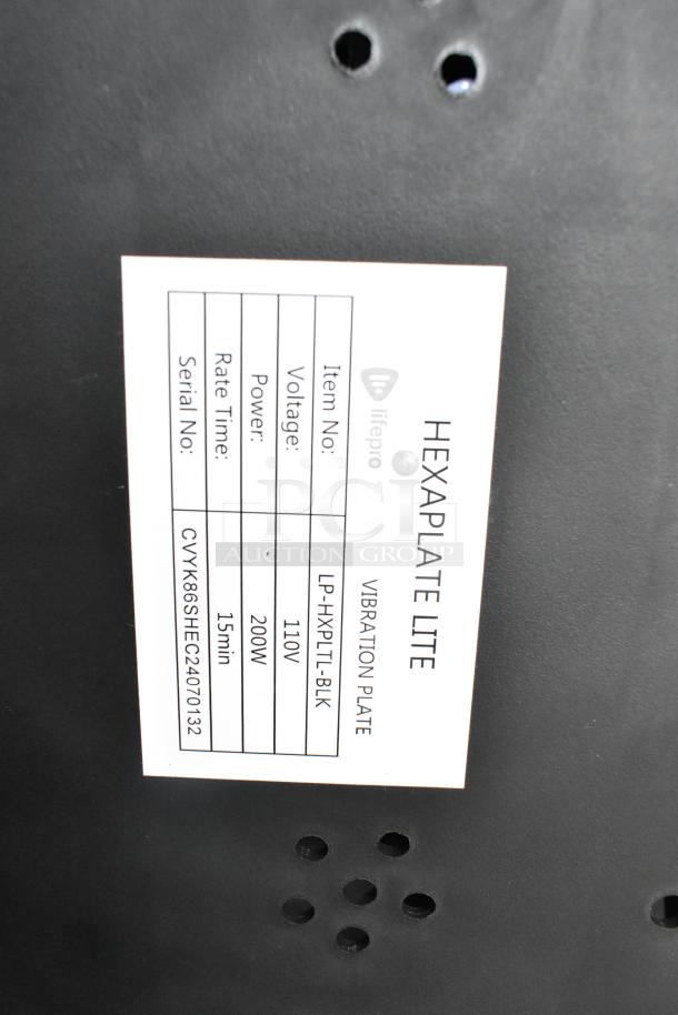 LifePro Hexaplate Lite Vibration Plate label showing model LP-HXPLT-BLK, 110V, 200W, 15min rate time.