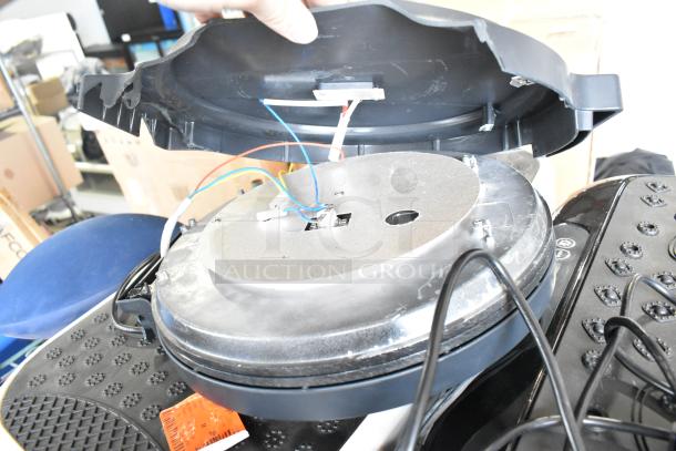 Four items: Hurtle HURVBTR36 vibration plate, LifePro vibration plate, Chefman RJ58-EM-MIDNIGHT-AM-E pizza maker, Harman Kardon speaker.