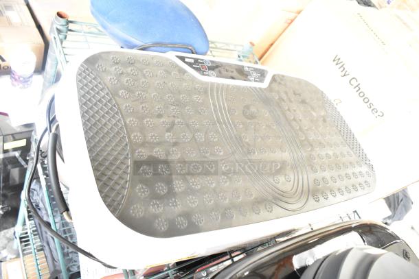 Hurtle HURVBTR36 vibration plate with textured surface, control panel, appears in good condition; part of a 4-item auction set.