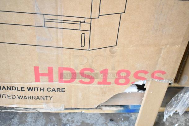 Cardboard box with visible "HDS18SS" marking, indicating Honeywell dishwasher model. Box shows minor damage.