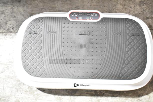 Brand new LifePro WVR 1010 Vibration Plate, scratch and dent. Features control panel, textured platform, and speed settings.