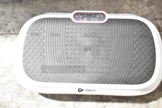 Brand new LifePro WVR 1010 Vibration Plate, scratch and dent. Features control panel, textured platform, and speed settings.