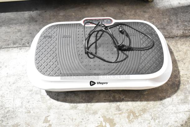 Brand new LifePro WVR 1010 Vibration Plate, black and white, slight scratches, includes control panel and power cord.