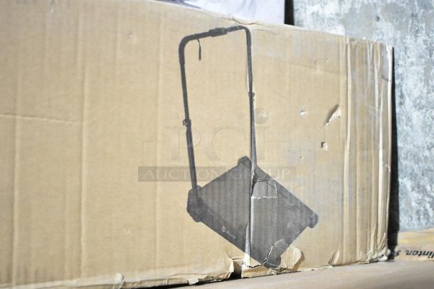 Cardboard box with illustration of LifePro Pacer Mini Pro Walking Pad. Box shows dents and scratches, indicating minor damage.