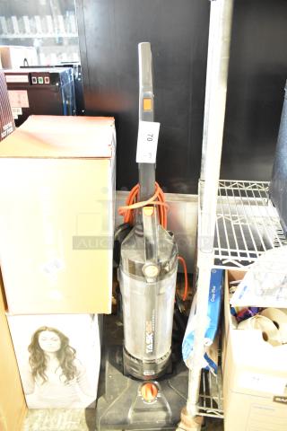 Hoover CH53010 Vacuum Cleaner, upright, 120 volts, 1 phase, black and orange, used, features "TaskVac" branding.