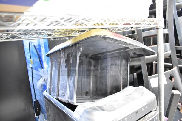 Fellowes Powershred LX180 black cross-cut shredder, open bin view, visible wear and scratches, ideal for secure shredding.