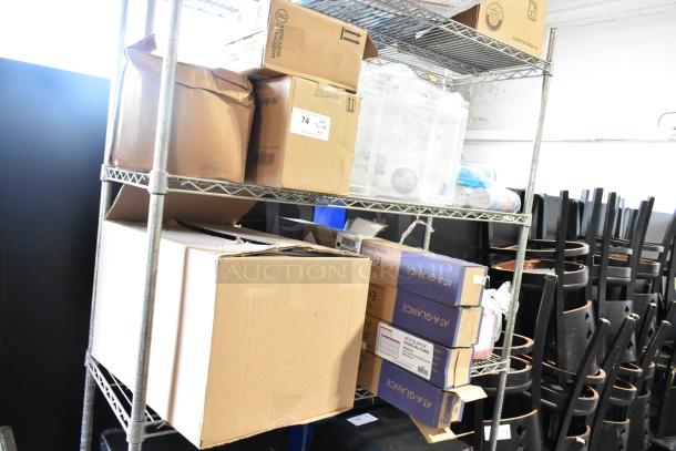 Two-tier shelf with Diversey cleaners, Gojo Foam Handwash, Ajax Cleaner, boxed and stacked, includes labels and markings.