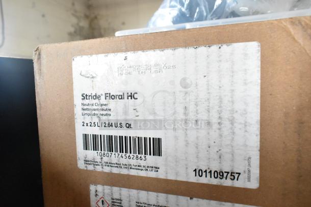 Cardboard box labeled "Stride Floral HC Neutral Cleaner." Capacity: 2 x 2.5L. Part of two-tier lot with various cleaning products.