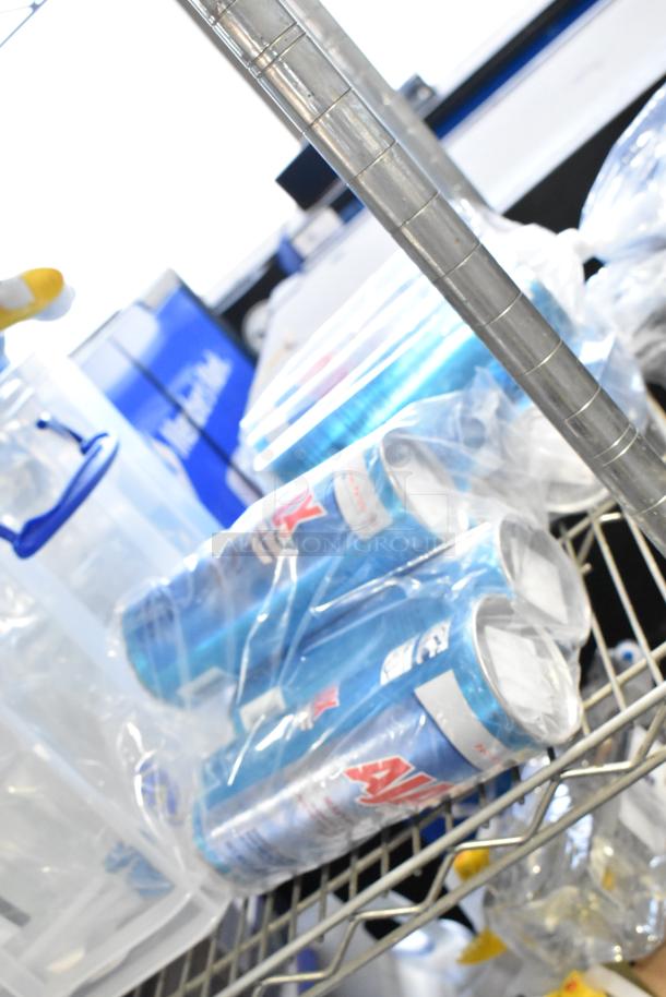 Two-tier shelf with Diversey cleaners, Gojo foam handwash, Ajax cleaner. Contains heavy-duty and neutral cleaning products.