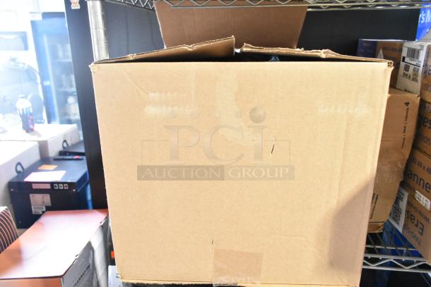 Two-tier lot with Diversey Heavy Duty Floor Cleaner, Neutral Cleaner, Gojo Foam Handwash, and Ajax Cleaner in cardboard box.