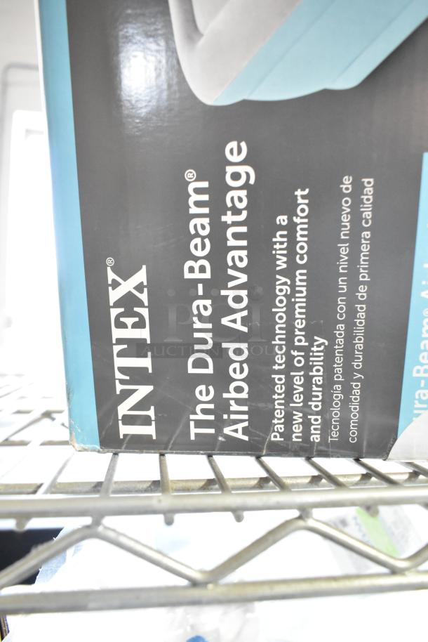 Intex Dura Beam Airbed Advantage box, featuring patented technology for comfort and durability. Packaging appears slightly worn.