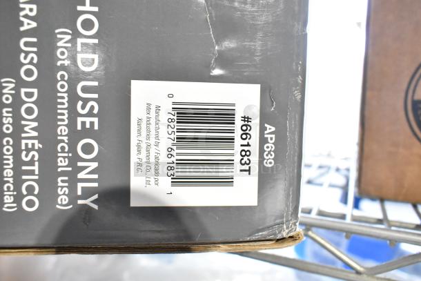 Intex Dura Beam Airbed Advantage in original packaging. Box shows barcode, model #66183T, and manufacturing details.