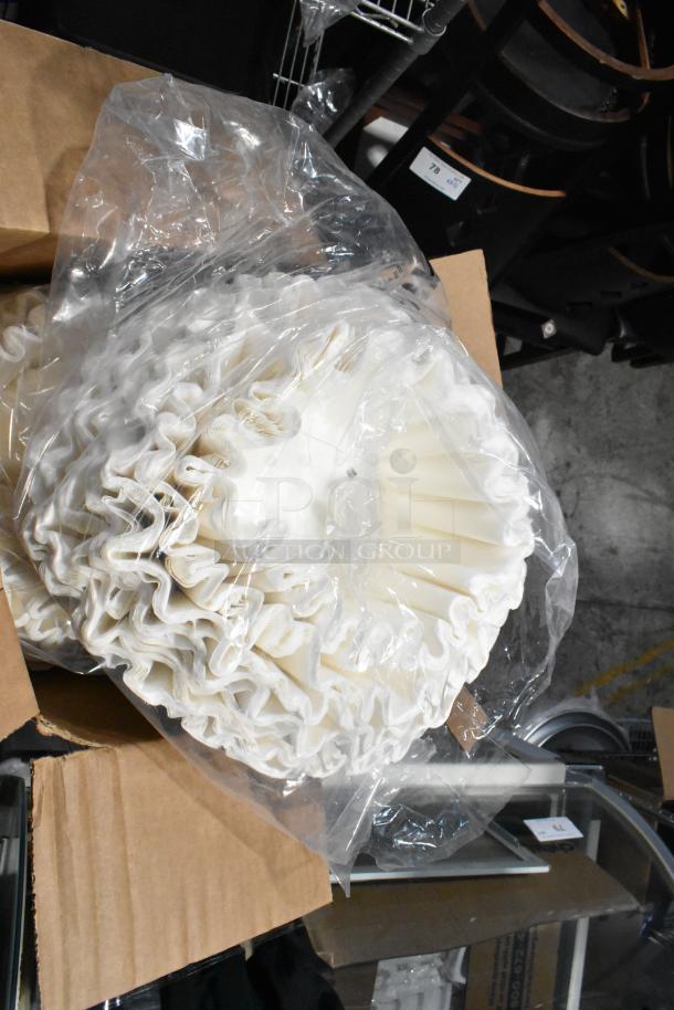 Bunn 0111.0000 coffee filters, bundled in a plastic bag, in new condition, packaged in a cardboard box.