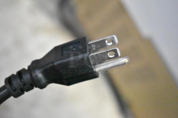 Close-up of power plug for Avantco 178SS1RHC Commercial Cooler. Unit is brand new with minor scratches and dents.