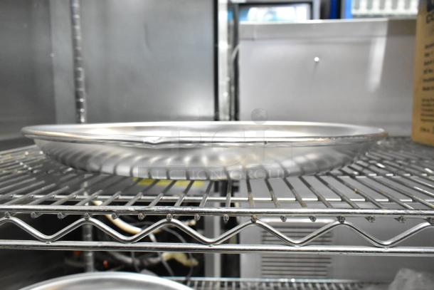 Avantco aluminum seafood tray, 15.75x2 inches, model 178SS1RHC, new scratch and dent condition, on wire rack.