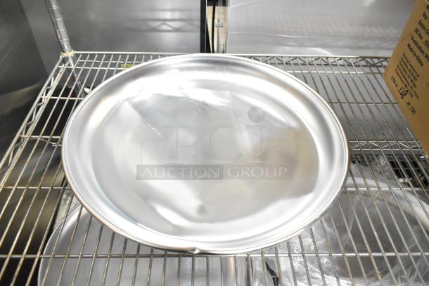 Avantco aluminum seafood tray, model 178SS1RHC, 15.75" round, new scratch and dent, on metal shelf.