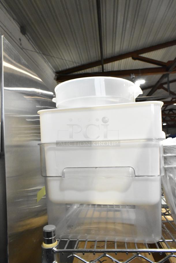 10 new kitchen items include bowls, food containers, basting cover, sediment trays; scratch and dent condition.