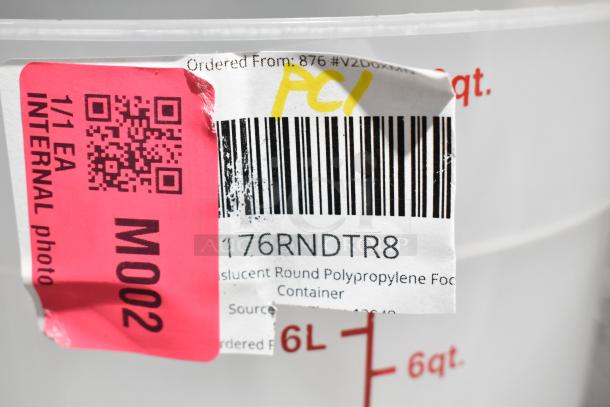 Close-up of a translucent round polypropylene food container with a 6-quart marking. Includes visible barcode and red QR-coded label.