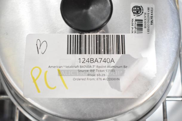 American Metalcraft BA740A basting cover with black knob, 7" aluminum. Label shows barcode, price, and source details.