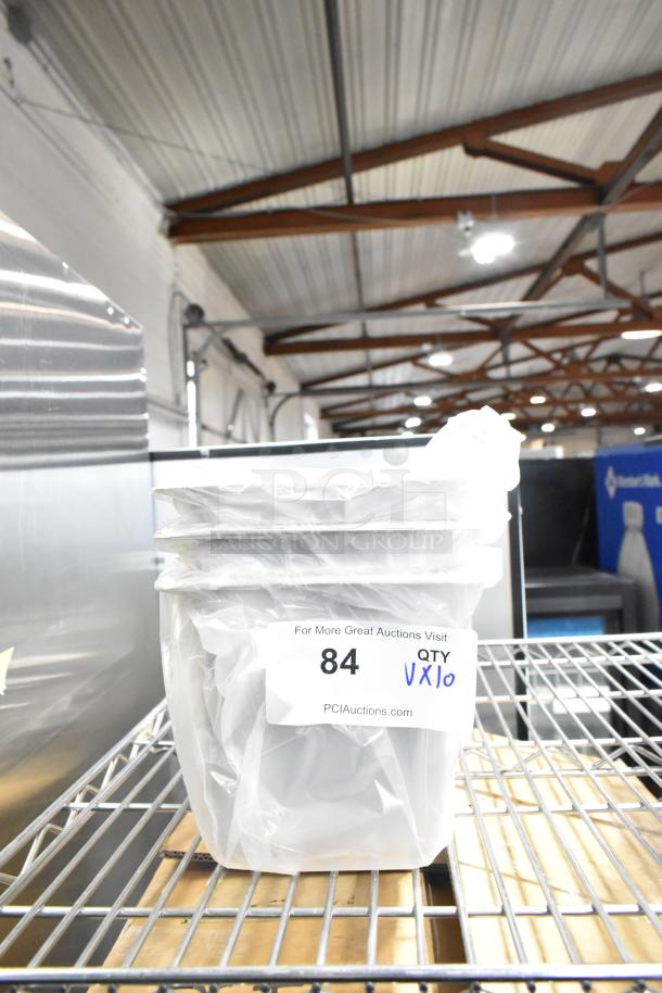 10 new scratch and dent items including bowls, food containers, basting cover, sediment trays. Labeled 'Qty 10'.