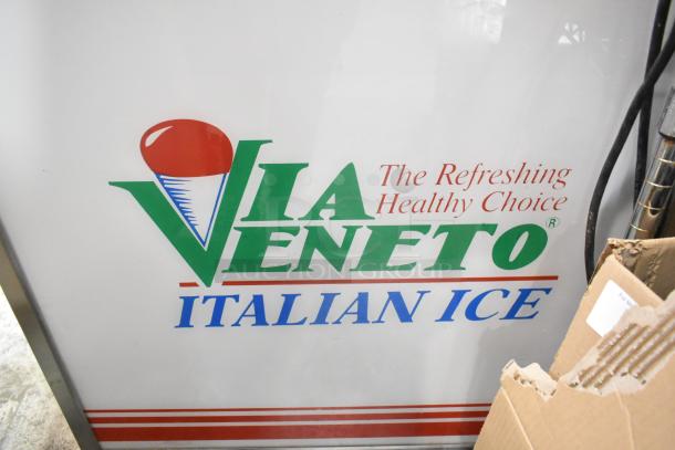 Commercial chest freezer with "Via Veneto Italian Ice" branding, featuring two center hinge lids and a sink bay.