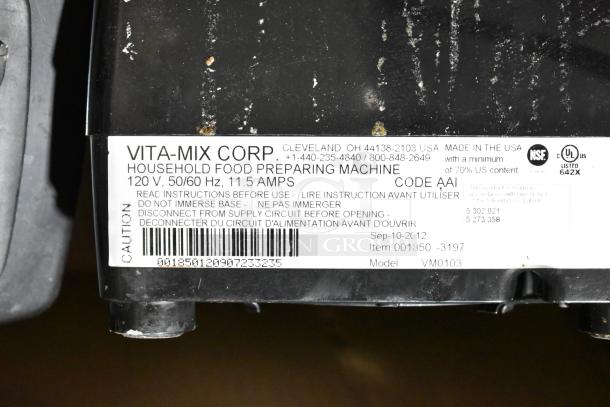 Two Vita-Mix blenders, models VM0102/VM0103, no lids, 120 volts, 1 phase. Label with specs and contact details visible.