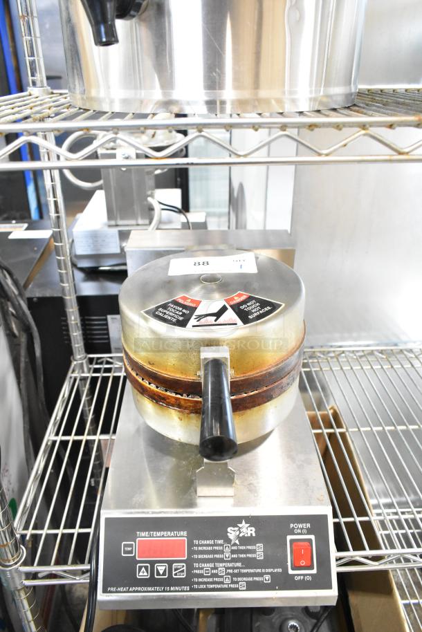Star SWCBE countertop waffle cone maker, 120V, 1-phase, with temperature controls, moderate wear, on stainless steel base.