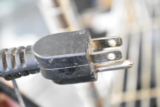 Close-up of an electric plug for the Star SWCBE Countertop Waffle Cone Maker, 120 Volts, 1 Phase.